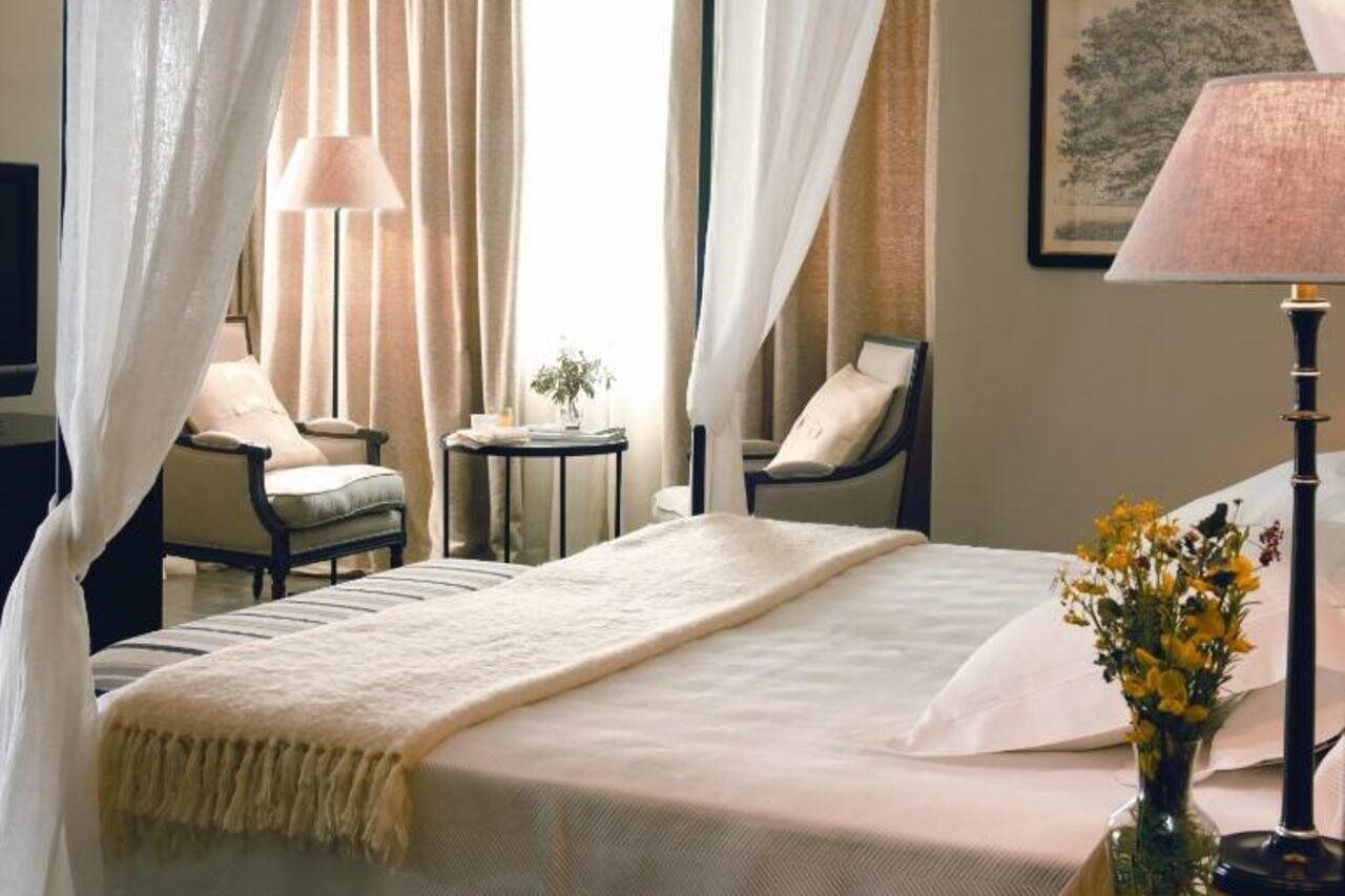 아시아 가든 호텔 앤 타이 스파, 어 로얄 하이드어웨이 호텔 피네스트라트 외부 사진 A bedroom at the Mandarin Oriental, Bangkok